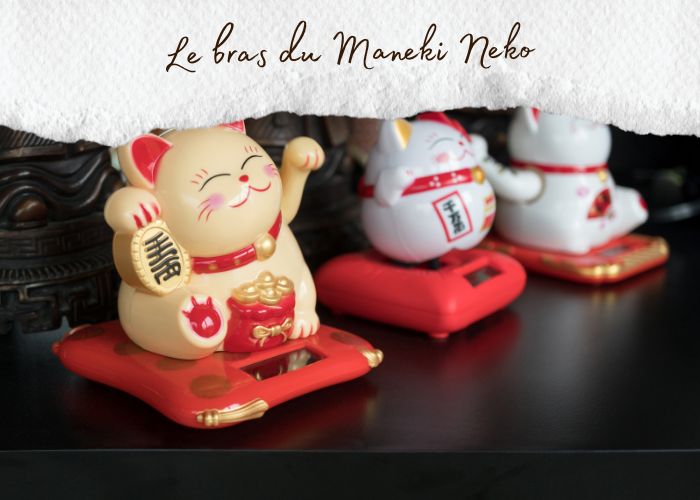 chat maneki neko bras qui bouge signification​
